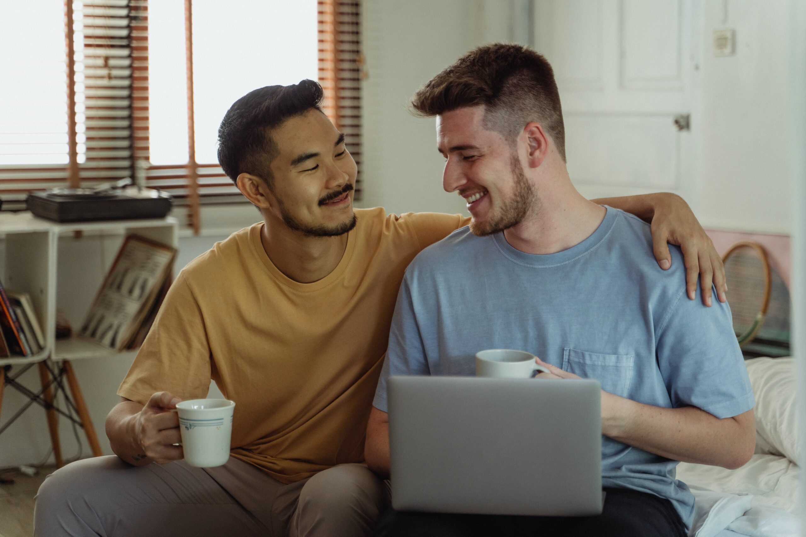 Senior man smiles as he looks at his nephew.